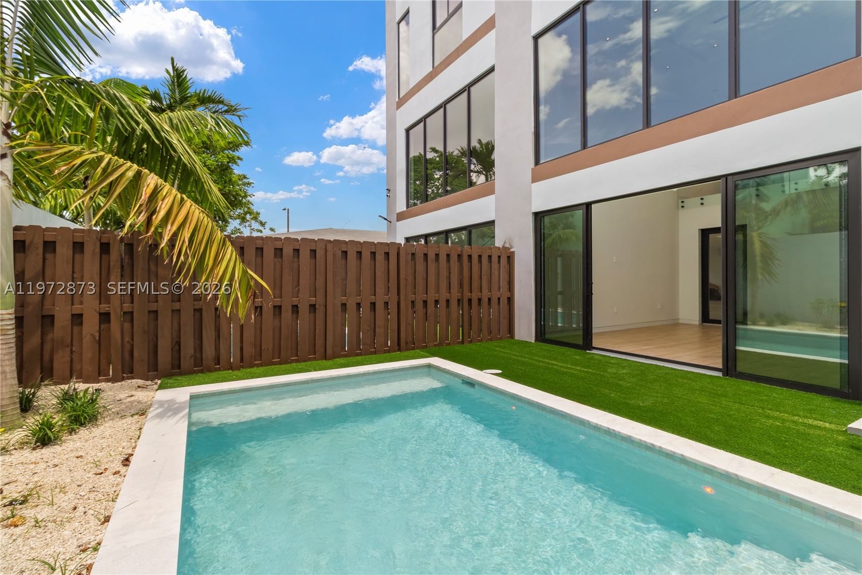 Backyard facade with pool